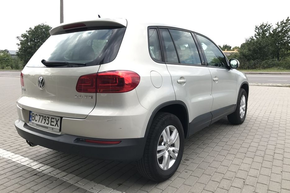 Tiguan 2013 2.0 tsi. Тигуан 2013 года. Ниссан Тигуан. Бежевый Тигуан 2013 года выпуска. Фольксваген Тигуан 2013 Размеры.