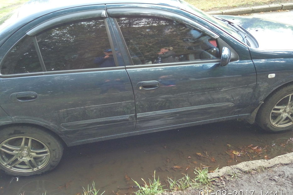 Nissan almera 2008 год