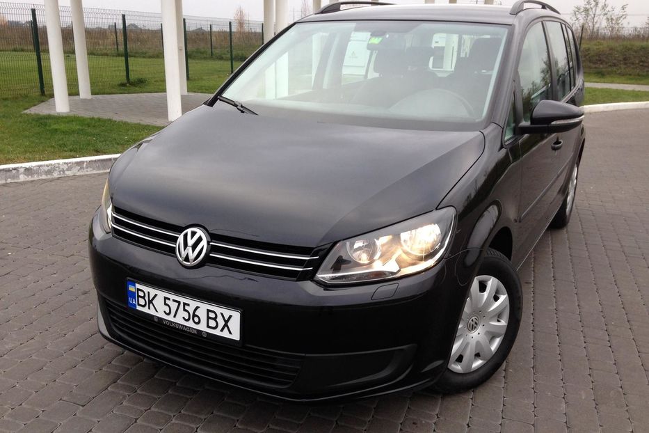 Volkswagen golf touran. Фольксваген туран автомат. Фольксваген туран 2012 спереди. Фольксваген туран 2010 1. Фольксваген туран автомат.