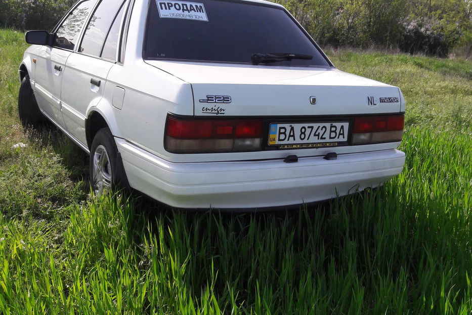 Продам Mazda 323 Тонировка окон 1989 года в г. Александрия, Кировоградская область