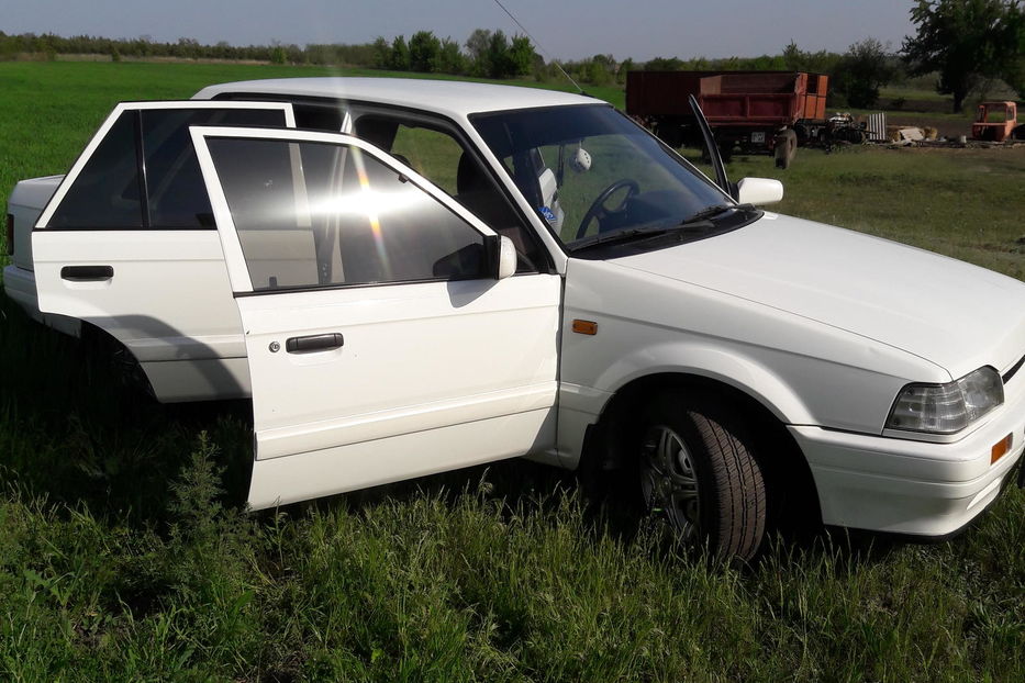 Продам Mazda 323 Тонировка окон 1989 года в г. Александрия, Кировоградская область