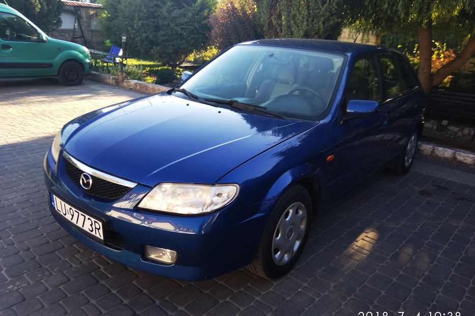 Продам Mazda 323 ГБО-4 2003 года в г. Ирпень, Киевская область