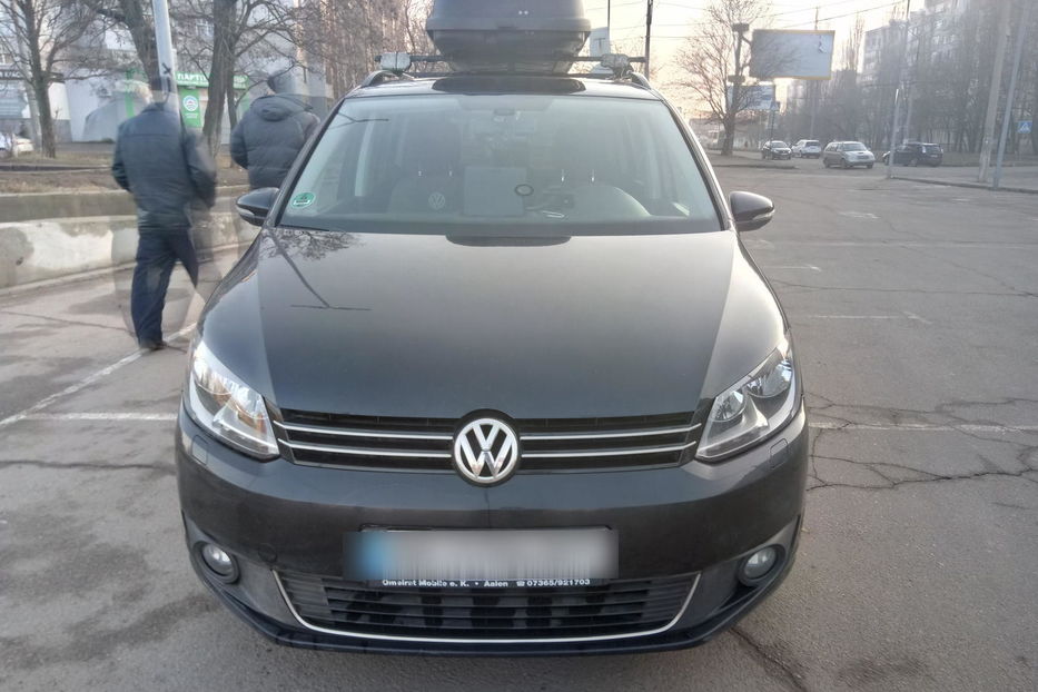 Продам Volkswagen Touran коифорт комплектация 2014 года в Николаеве