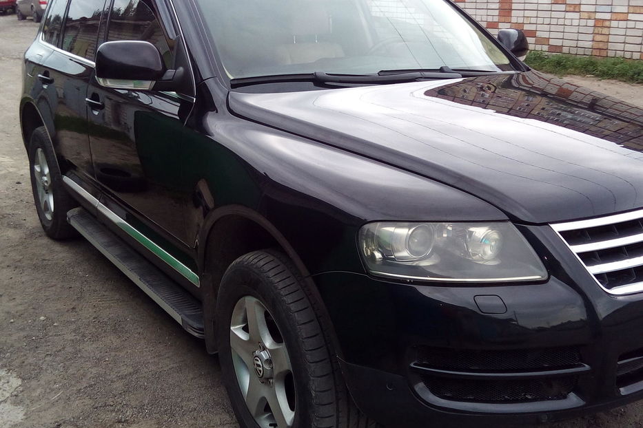 Туарег r5. Volkswagen Touareg 2006 черный. Туарег 2006 черный в ткани. Диски Туарег r18.