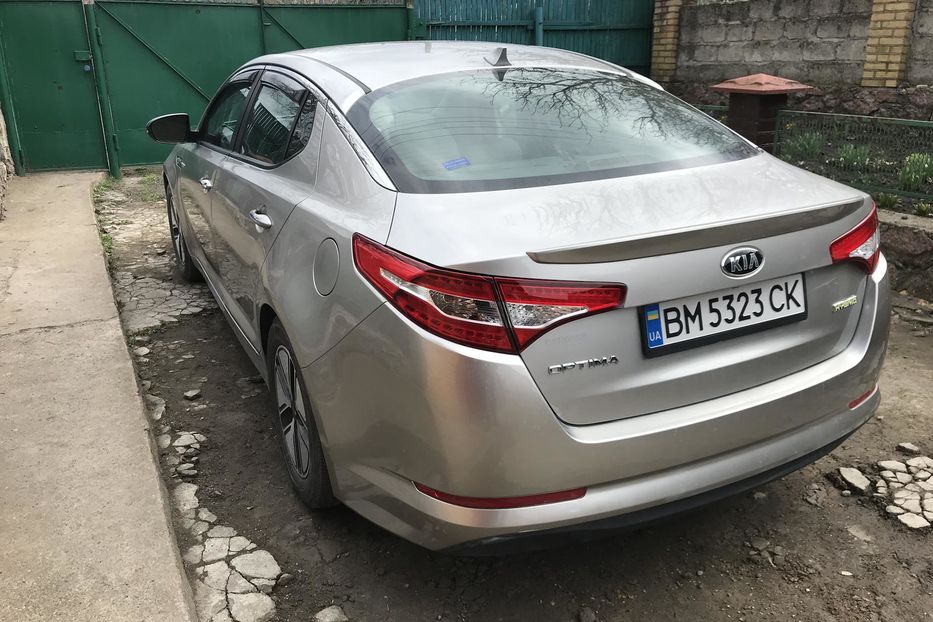 Продам Kia Optima Гибрид + ГБО 2013 года в Кропивницком