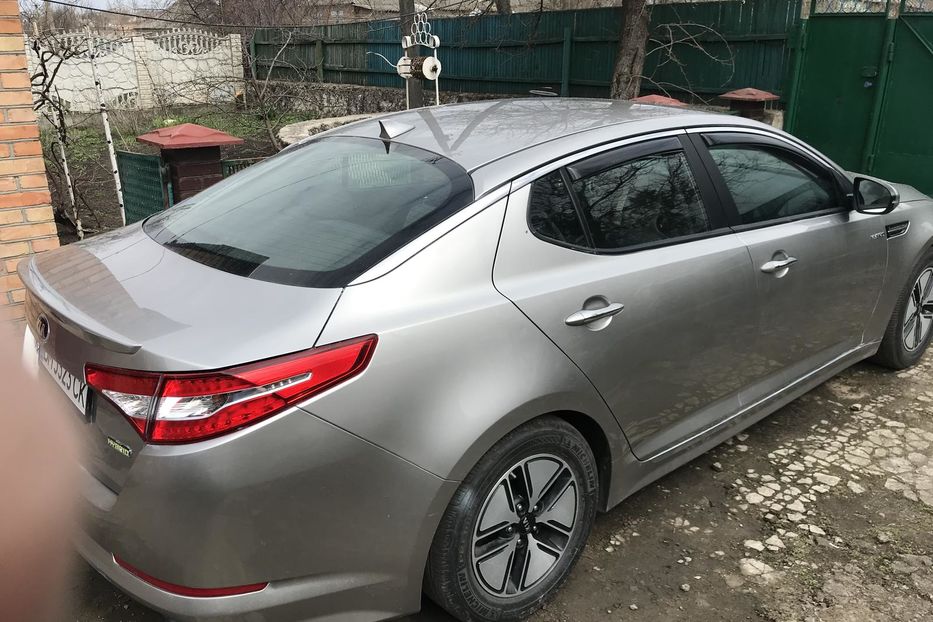 Продам Kia Optima Гибрид + ГБО 2013 года в Кропивницком