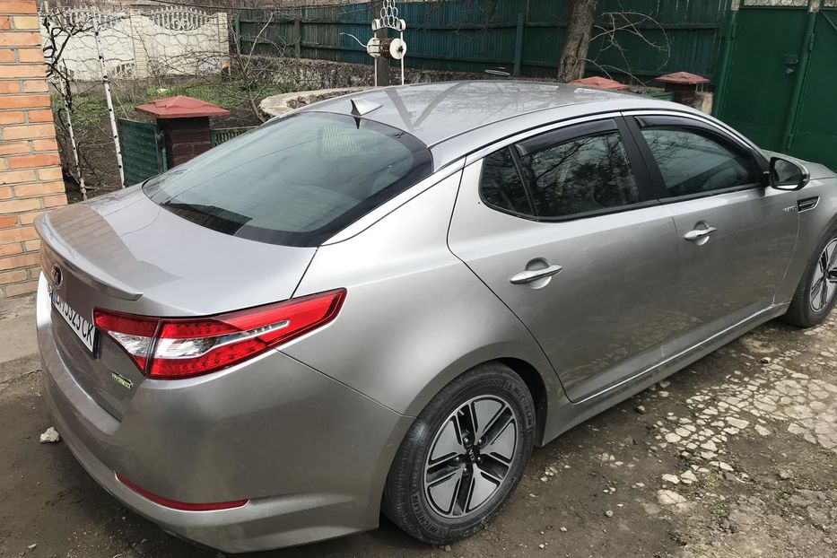 Продам Kia Optima Гибрид + ГБО 2013 года в Кропивницком