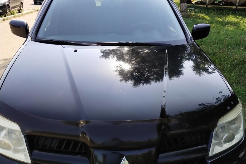 Продам Mitsubishi Outlander 2.4 4WD 2009 года в Киеве