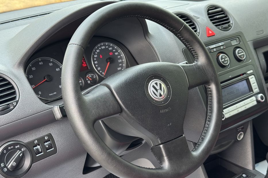 Продам Volkswagen Caddy пасс. COMIS  2009 года в г. Умань, Черкасская область